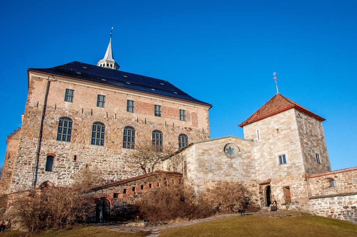 Brick and stone buildings on a hill