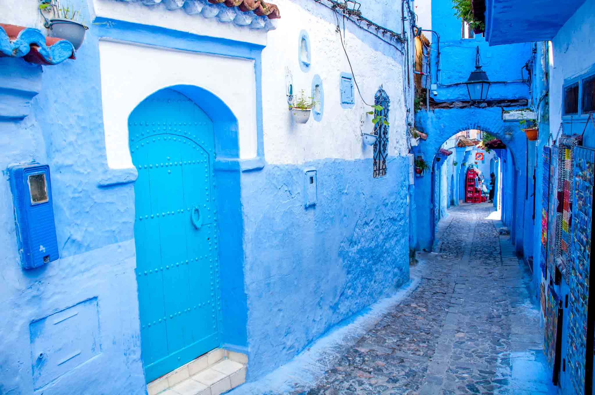 Blue and white passageway and arches.