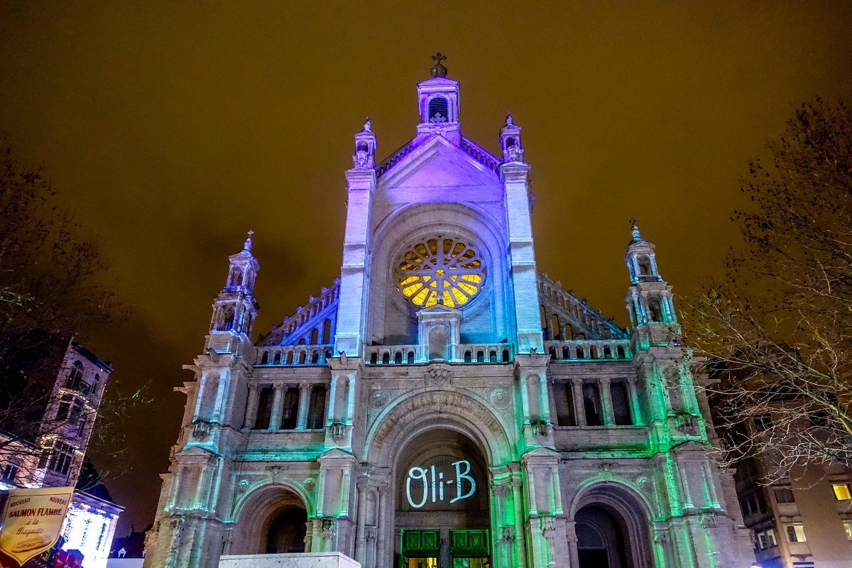 Church lit up in multiple colors for light show. 