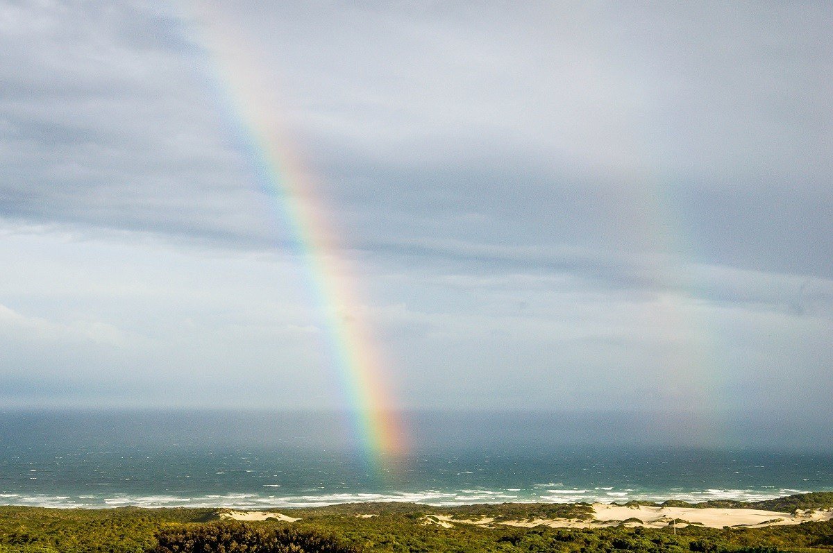 An unusual double rainbow over Walker Bay as viewed from the Grootbos Garden Lodge