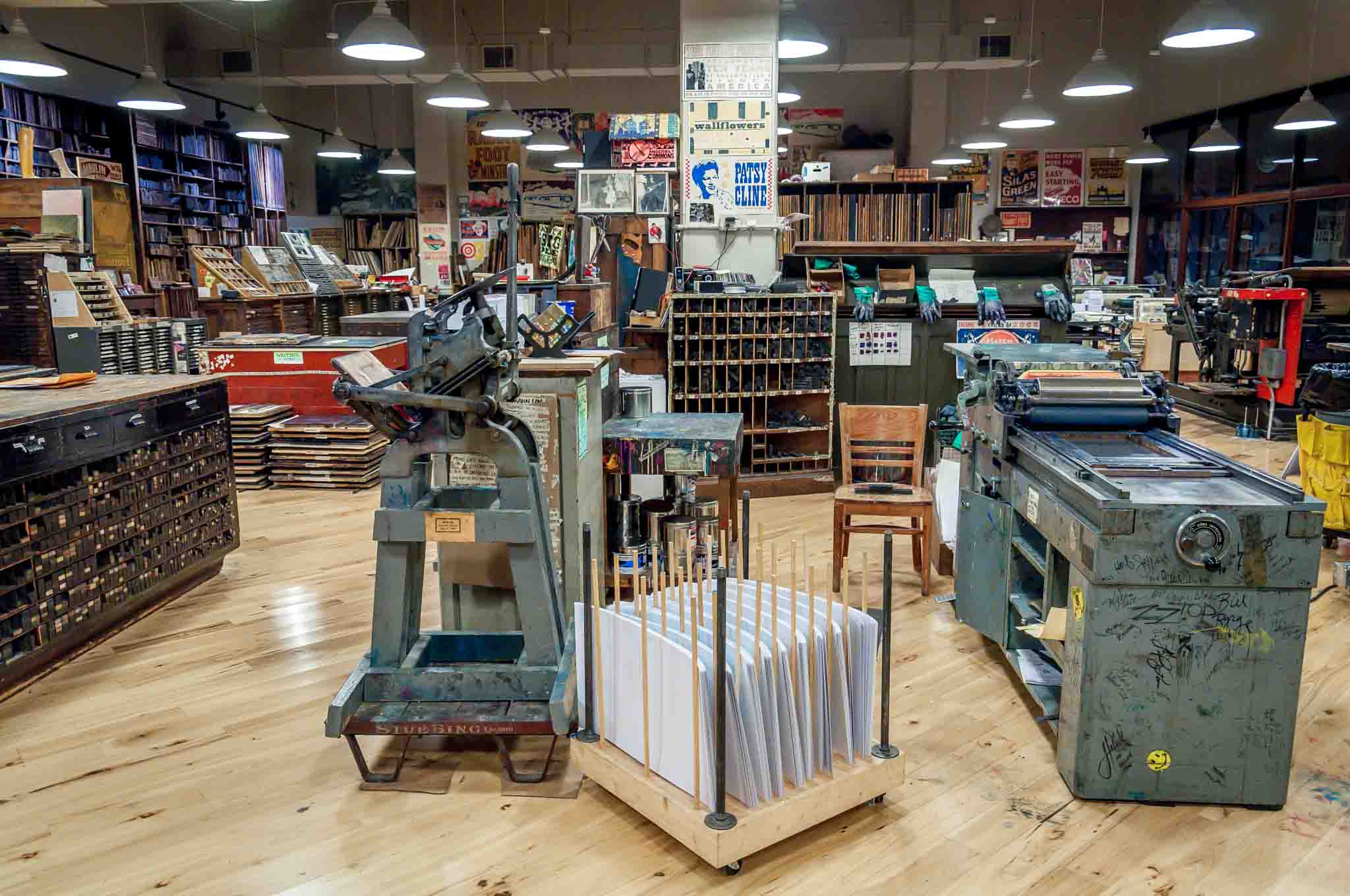 Letterpresses and posters in a print shop.