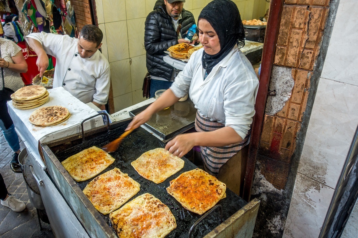 Woman cooking traditional Moroccan food