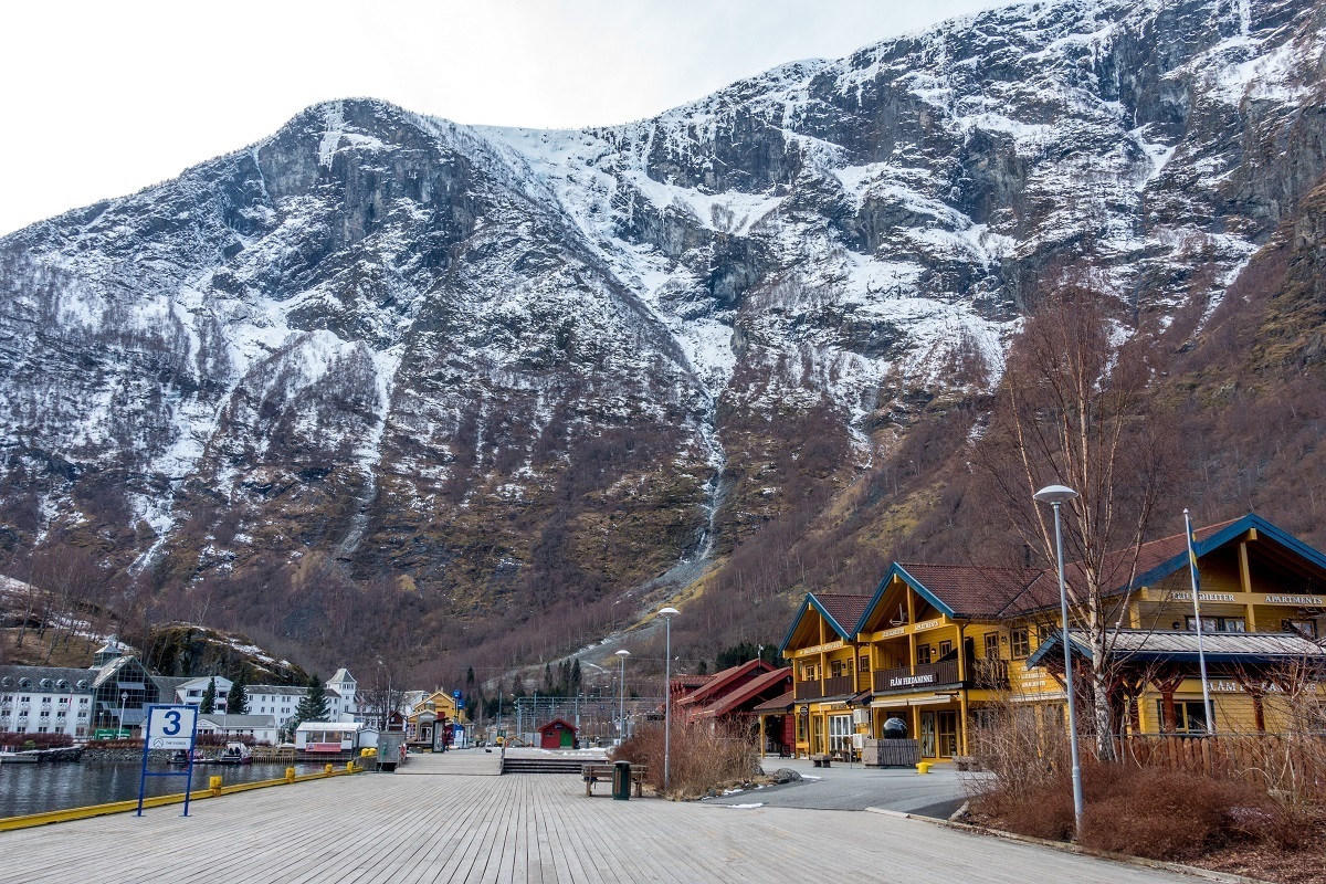 Buildings at the base of a mountain