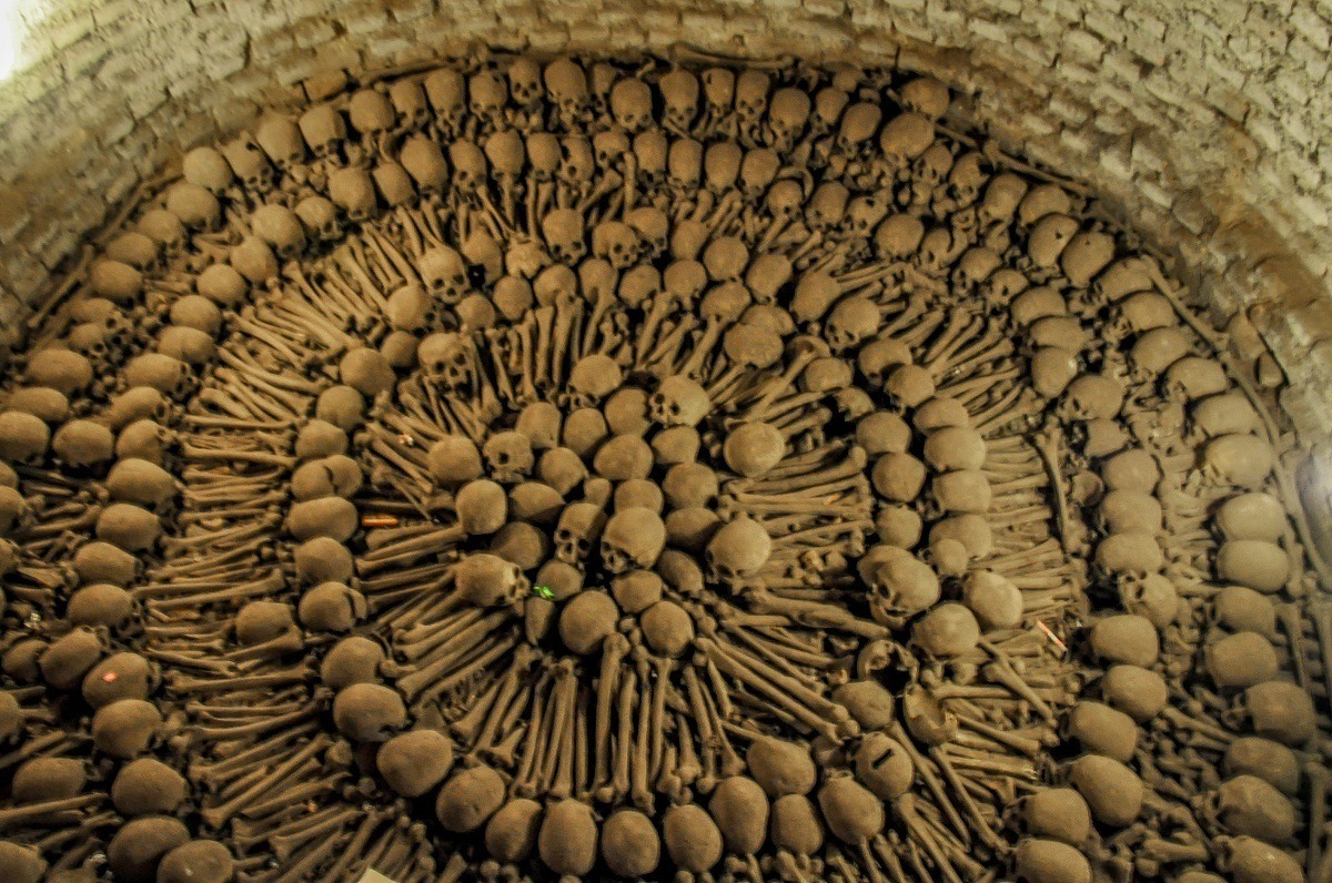 Visiting the catacombs at the Monastery of San Francisco is one of the creepiest things to do in Lima