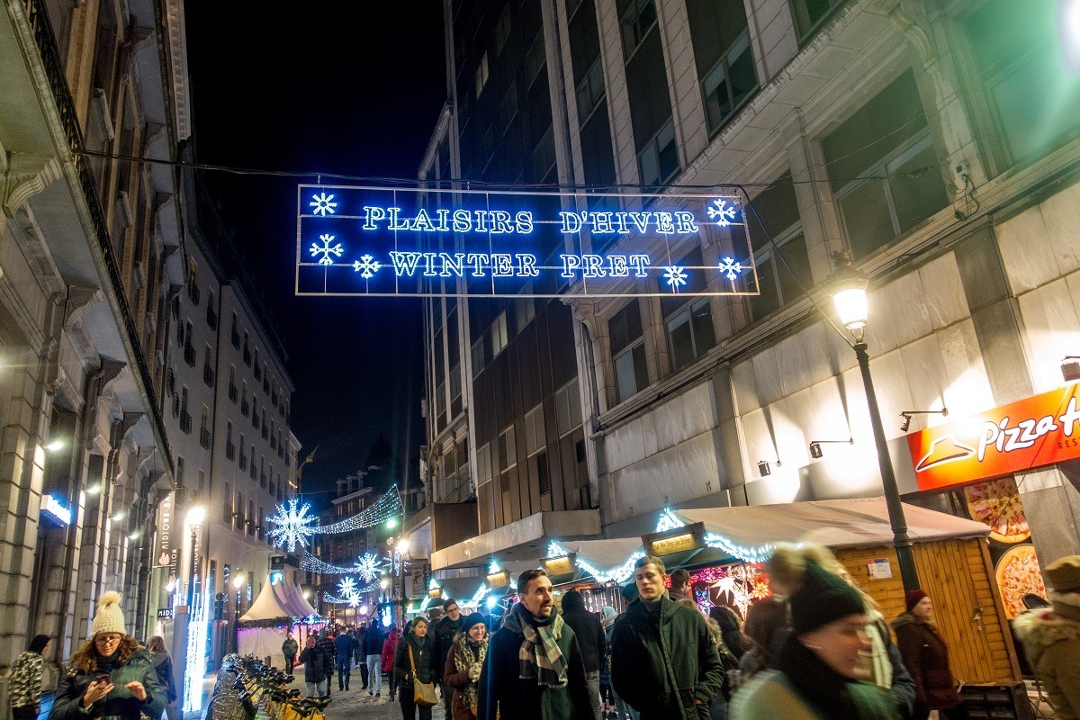 People shopping at Christmas market stalls