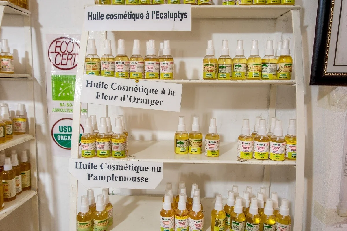 Bottles of argan oil on shelf