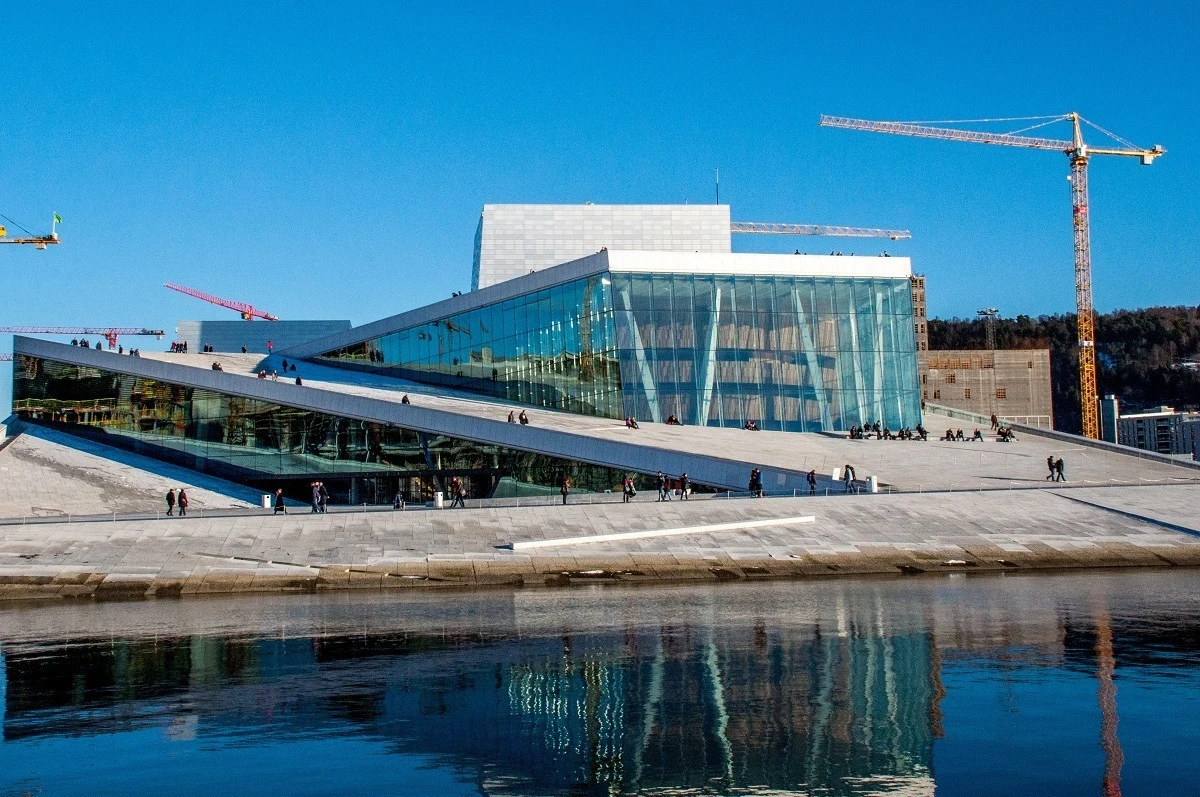 Building with a glass facade beside the water