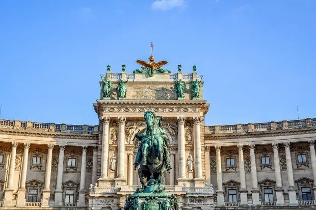 Statue and building in a palace complex